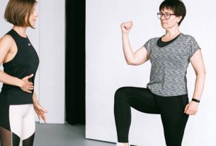 Two women working out together, demonstrating fitness exercises on a white background.